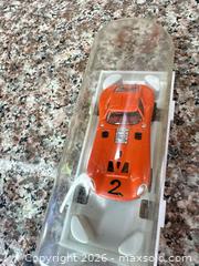 MaxSold Auction: Aurora (Model Motoring) Orange Slot Car - Vintage - San Jose (California, USA) PARTNER MANAGED Estate Sale Online Auction -  E Humboldt