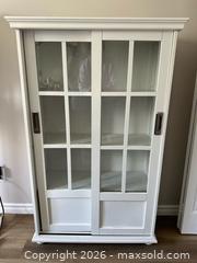 MaxSold Auction: White Cabinet with Slide Doors - Ottawa (Ontario, Canada) SELLER MANAGED Downsizing Online Auction - Woodvale Green (STORAGE)
