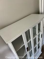 MaxSold Auction: White Cabinet with Slide Doors - Ottawa (Ontario, Canada) SELLER MANAGED Downsizing Online Auction - Woodvale Green (STORAGE)