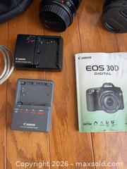MaxSold Auction: Canon EOS 30D DSLR Camera Kit with Lenses - Kingston (Ontario, Canada) PARTNER MANAGED Downsizing Online Auction - Princess Street (STORAGE)