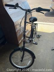 MaxSold Auction: Schwinn Loop Folding Bicycle With Rack - Kingston (Ontario, Canada) PARTNER MANAGED Downsizing Online Auction - Princess Street (STORAGE)