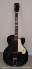 MaxSold Auction: Silvertone Archtop Hollow-Body Acoustic Guitar, Black - Toronto (Ontario, Canada) PARTNER MANAGED Reseller Online Auction - Queen Street Wt.