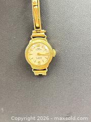 MaxSold Auction: Vintage Technos Ladies Cocktail Watch with 9ct gold band. - Ottawa (Ontario, Canada) PARTNER MANAGED Downsizing Online Auction - Mc Garry Terr (STORAGE)
