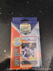 MaxSold Auction: Gems of the Game Hockey Pack w/ 1 Graded Card, 3 Sealed Packs - Welland (Ontario, Canada) SELLER MANAGED Reseller Online Auction - Young Road