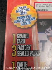 MaxSold Auction: Gems of the Game Hockey Pack w/ 1 Graded Card, 3 Sealed Packs - Welland (Ontario, Canada) SELLER MANAGED Reseller Online Auction - Young Road
