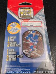 MaxSold Auction: Gems of the Game Hockey Pack w/ 1 Graded Card, 3 Sealed Packs - Welland (Ontario, Canada) SELLER MANAGED Reseller Online Auction - Young Road