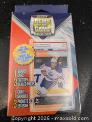 MaxSold Auction: Hockey Trading Card Lot: 1 Graded Card + 3 Factory Sealed Packs - Welland (Ontario, Canada) SELLER MANAGED Reseller Online Auction - Young Road