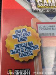 MaxSold Auction: Hockey Trading Card Lot: 1 Graded Card + 3 Factory Sealed Packs - Welland (Ontario, Canada) SELLER MANAGED Reseller Online Auction - Young Road
