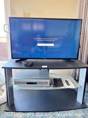 MaxSold Auction: 39" Flat Screen TV with Stand and DVD/VCR Combo - Castro Valley (California, USA) PARTNER MANAGED Estate Sale Online Auction - Dunnigan Court