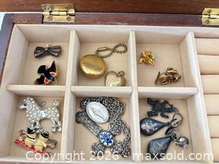 MaxSold Auction: Small Wood Jewelry Armoire with Assorted Jewelry & Watches - Castro Valley (California, USA) PARTNER MANAGED Estate Sale Online Auction - Dunnigan Court