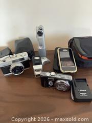 MaxSold Auction: Camera lot. A - South Huron (Ontario, Canada) PARTNER MANAGED Estate Sale Online Auction - Gidley Street West