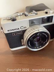 MaxSold Auction: Camera lot. A - South Huron (Ontario, Canada) PARTNER MANAGED Estate Sale Online Auction - Gidley Street West