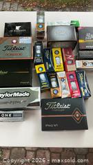 MaxSold Auction: Assorted Titleist, Callaway & TaylorMade Golf Balls (30+) - Markham (Ontario, Canada) PARTNER MANAGED Downsizing Online Auction - Forest Park Crescent