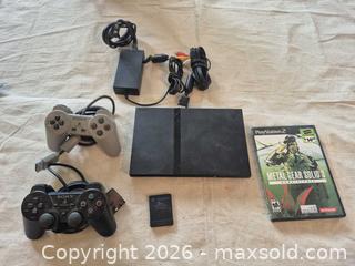 MaxSold Auction: PlayStation 2 Slim with 2 Wired Controllers & Metal Gear Solid 3 - Markham (Ontario, Canada) PARTNER MANAGED Downsizing Online Auction - Forest Park Crescent