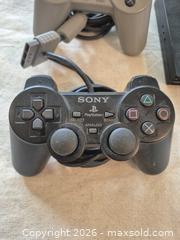 MaxSold Auction: PlayStation 2 Slim with 2 Wired Controllers & Metal Gear Solid 3 - Markham (Ontario, Canada) PARTNER MANAGED Downsizing Online Auction - Forest Park Crescent