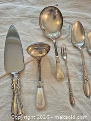 MaxSold Auction: Sterling Silver and Plated Utensils With White Orchid Mother-of-Pearl Handled Spoon - Markham (Ontario, Canada) PARTNER MANAGED Downsizing Online Auction - Forest Park Crescent