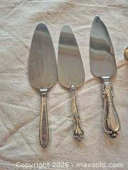 MaxSold Auction: Sterling Silver and Plated Utensils With White Orchid Mother-of-Pearl Handled Spoon - Markham (Ontario, Canada) PARTNER MANAGED Downsizing Online Auction - Forest Park Crescent