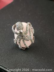 MaxSold Auction: Dallas Prince Signed 925 Thailand Octopus Ring with Rose Pink Cabochon, Size 7 - Richmond (British Columbia, Canada) SELLER MANAGED Downsizing Online Auction - Riverside Way (STORAGE)