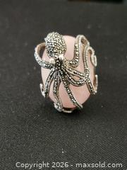 MaxSold Auction: Dallas Prince Signed 925 Thailand Octopus Ring with Rose Pink Cabochon, Size 7 - Richmond (British Columbia, Canada) SELLER MANAGED Downsizing Online Auction - Riverside Way (STORAGE)