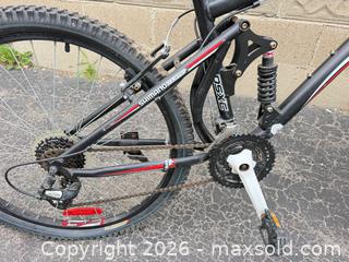 MaxSold Auction: Kranked 26" Full-Suspension Mountain Bike, 21-Speed, Shimano Components - Toronto (Ontario, Canada) SELLER MANAGED Downsizing Online Auction - Palamar Road