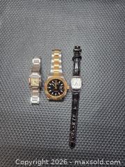 MaxSold Auction: Lot of 3 Watches with Metal and Leather Bands - New Westminster (British Columbia, Canada) SELLER MANAGED Downsizing Online Auction - Hamilton Street
