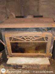 MaxSold Auction: Freestanding Cast Iron Wood Burning Stove with Glass Window  - South Frontenac (Ontario, Canada) SELLER MANAGED Downsizing Online Auction - Battersea Road