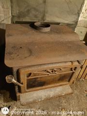 MaxSold Auction: Freestanding Cast Iron Wood Burning Stove with Glass Window  - South Frontenac (Ontario, Canada) SELLER MANAGED Downsizing Online Auction - Battersea Road