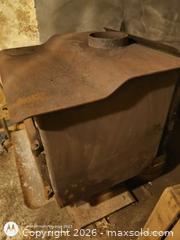 MaxSold Auction: Freestanding Cast Iron Wood Burning Stove with Glass Window  - South Frontenac (Ontario, Canada) SELLER MANAGED Downsizing Online Auction - Battersea Road