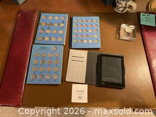 MaxSold Auction: Lot: Canadian Coin Albums, Encapsulated 1966 Dollar, Kobo E?reader - London (Ontario, Canada) PARTNER MANAGED Estate Sale Online Auction -  Mcgarrell Drive