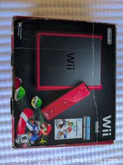 MaxSold Auction: Nintendo Wii Mini Red/Black Console with Just Dance 2016 - Welland (Ontario, Canada) SELLER MANAGED Reseller Online Auction -  Young Road