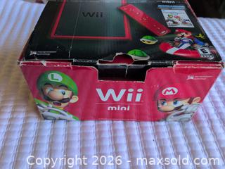 MaxSold Auction: Nintendo Wii Mini Red/Black Console with Just Dance 2016 - Welland (Ontario, Canada) SELLER MANAGED Reseller Online Auction -  Young Road