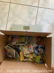 MaxSold Auction: 12.5lbs worth if assorted pokemon  - Oshawa (Ontario, Canada) SELLER MANAGED Downsizing Online Auction - Deer Valley Drive