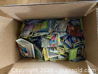 MaxSold Auction: 12.5lbs worth if assorted pokemon  - Oshawa (Ontario, Canada) SELLER MANAGED Downsizing Online Auction - Deer Valley Drive