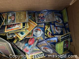 MaxSold Auction: 12.5lbs worth if assorted pokemon  - Oshawa (Ontario, Canada) SELLER MANAGED Downsizing Online Auction - Deer Valley Drive