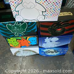 MaxSold Auction: 7 full pokemon etbs of cards - Oshawa (Ontario, Canada) SELLER MANAGED Downsizing Online Auction - Deer Valley Drive