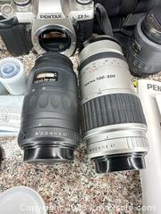 MaxSold Auction: Pentax ZX-5n 35mm SLR with 35-80, 80-200 & 100-300 Lenses - San Jose (California, USA) PARTNER MANAGED Estate Sale Online Auction - E Humboldt