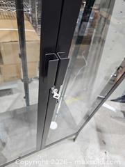 MaxSold Auction: Tall Black Metal & Glass Curio Display Cabinet with Locking Doors - Toronto (Ontario, Canada) PARTNER MANAGED Reseller Online Auction - Coldwater Road