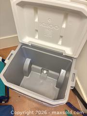 MaxSold Auction: Igloo 60 qt Rolling Cooler with Telescoping Handle and Playmate Cooler - Okatie (South Carolina, USA) SELLER MANAGED Moving Online Auction - Bee Tree Drive