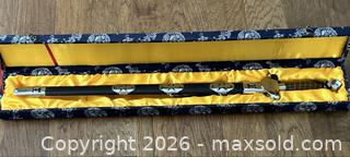 MaxSold Auction: Sword c/w Sheath and Presentation Carrying Case - Burlington (Ontario, Canada) SELLER MANAGED Estate Sale Online Auction -  Fairview Street (STORAGE)