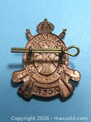 MaxSold Auction: Canadian Infrantry Corps WWII Cap Badge - Lincoln (Ontario, Canada) SELLER MANAGED Downsizing Online Auction - Bartlett Road (STORAGE)