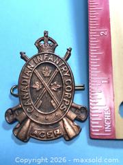 MaxSold Auction: Canadian Infrantry Corps WWII Cap Badge - Lincoln (Ontario, Canada) SELLER MANAGED Downsizing Online Auction - Bartlett Road (STORAGE)