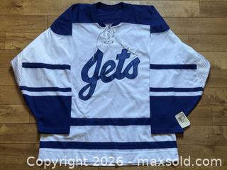 MaxSold Auction: Vintage CCM Winnipeg Jets Hockey Jersey Adult Large White/Navy - Ottawa (Ontario, Canada) PARTNER MANAGED Estate Sale Online Auction - Bongard Avenue (STORAGE)