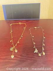 MaxSold Auction: Lot of Two Mixed-Metal Matinee Charm Necklaces Swarovski  - Toronto (Ontario, Canada) SELLER MANAGED Downsizing Online Auction -  Weston Road (CONDO)