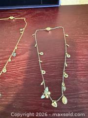 MaxSold Auction: Lot of Two Mixed-Metal Matinee Charm Necklaces Swarovski  - Toronto (Ontario, Canada) SELLER MANAGED Downsizing Online Auction -  Weston Road (CONDO)