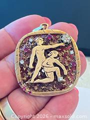 MaxSold Auction: (10K) 15.86g Vintage Gold Modernist High-Relief Figural Pendant w/ Ruby's & Diamonds - New Westminster (British Columbia, Canada) PARTNER MANAGED Downsizing Online Auction - Quayside Drive (CONDO)
