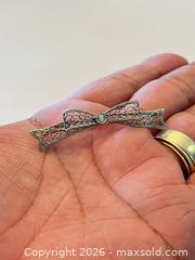MaxSold Auction: (14K) White Gold Filigree Bow Brooch with Diamond - New Westminster (British Columbia, Canada) PARTNER MANAGED Downsizing Online Auction - Quayside Drive (CONDO)