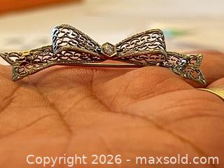 MaxSold Auction: (14K) White Gold Filigree Bow Brooch with Diamond - New Westminster (British Columbia, Canada) PARTNER MANAGED Downsizing Online Auction - Quayside Drive (CONDO)