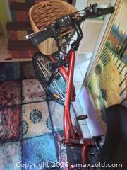 MaxSold Auction: BRAND NEW: Daymak Paris 48V Deluxe Electric Comfort Bike (Candy Red) - Toronto (Ontario, Canada) SELLER MANAGED Downsizing Online Auction - Nipigon Avenue