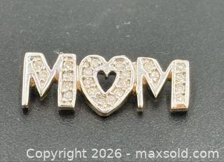 MaxSold Auction: 10K Gold Diamond "MOM" Heart Slide Pendant - Esquimalt (British Columbia, Canada) PARTNER MANAGED Reseller Online Auction - Lampson Street