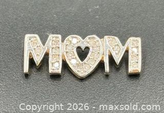 MaxSold Auction: 10K Gold Diamond "MOM" Heart Slide Pendant - Esquimalt (British Columbia, Canada) PARTNER MANAGED Reseller Online Auction - Lampson Street